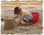 Boy Playing in Sand photo courtesy of Jack Porcello